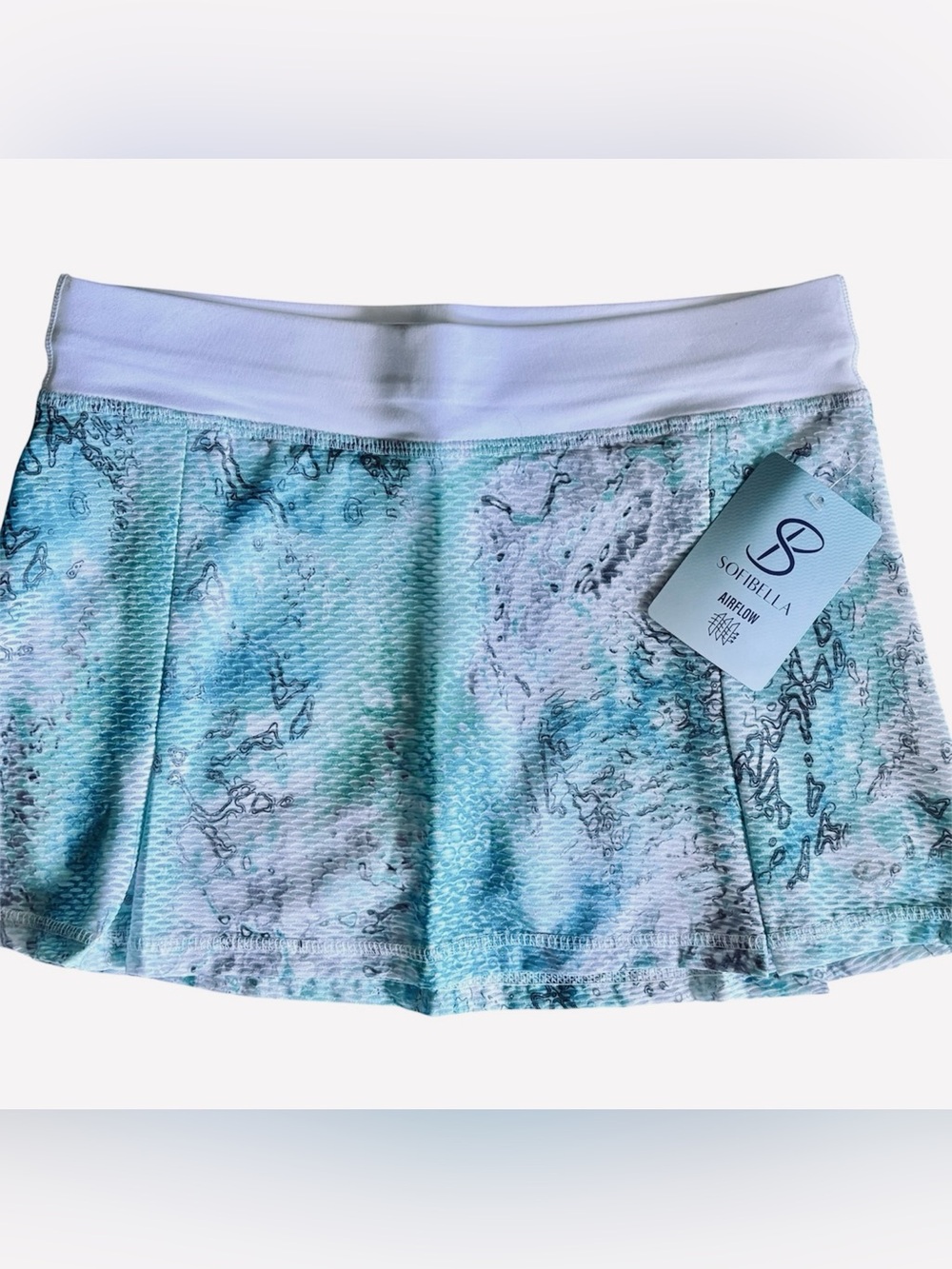 Women's Sofibella skort activewear in a beautiful combination of colors.